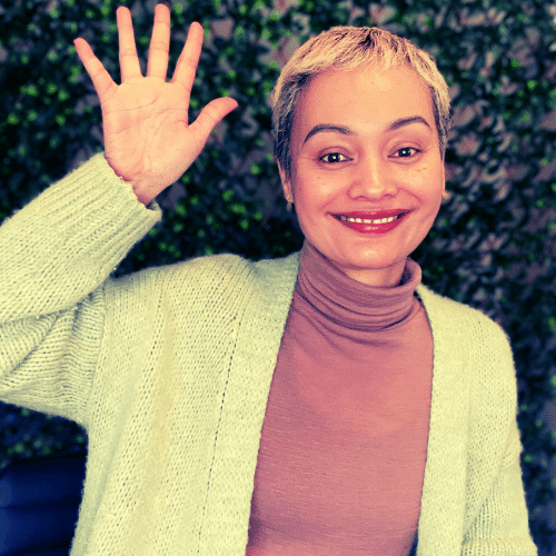 Candice Pardy smiling and waving